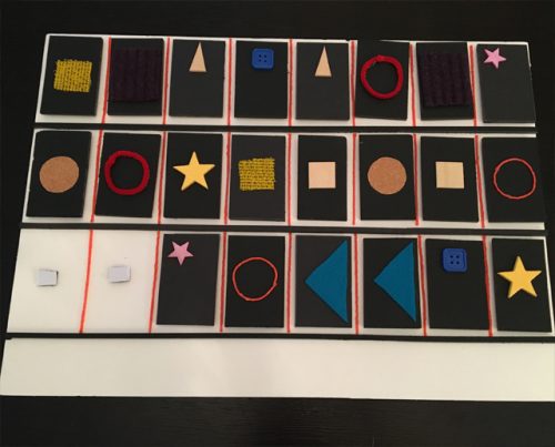 An example of a tactile matching game activity discussed in t