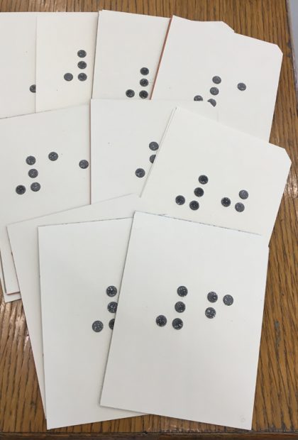 Braille tactile book pages showing the Braille numbers